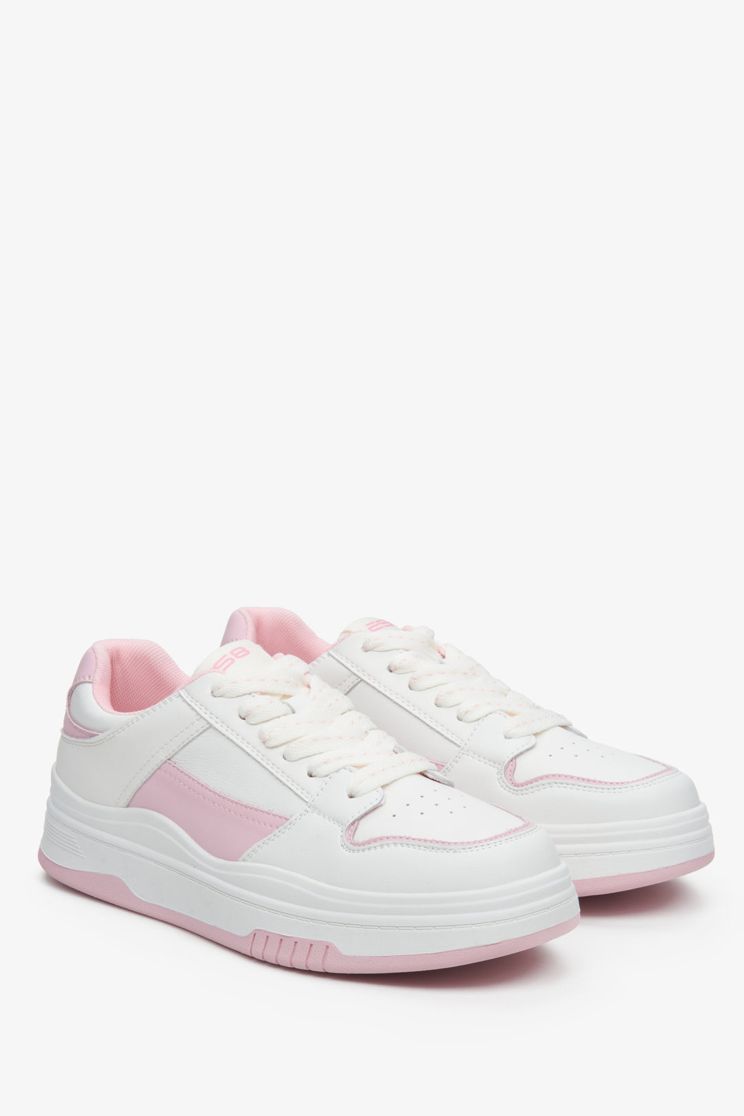 Women's white and pink leather sneakers.