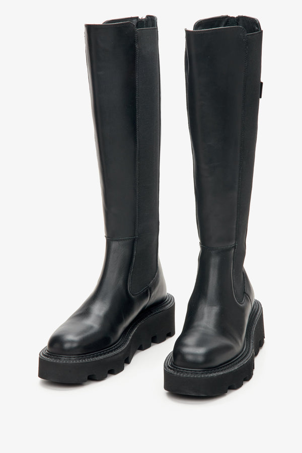 Estro women's black leather knee-high boots with an elastic shaft.