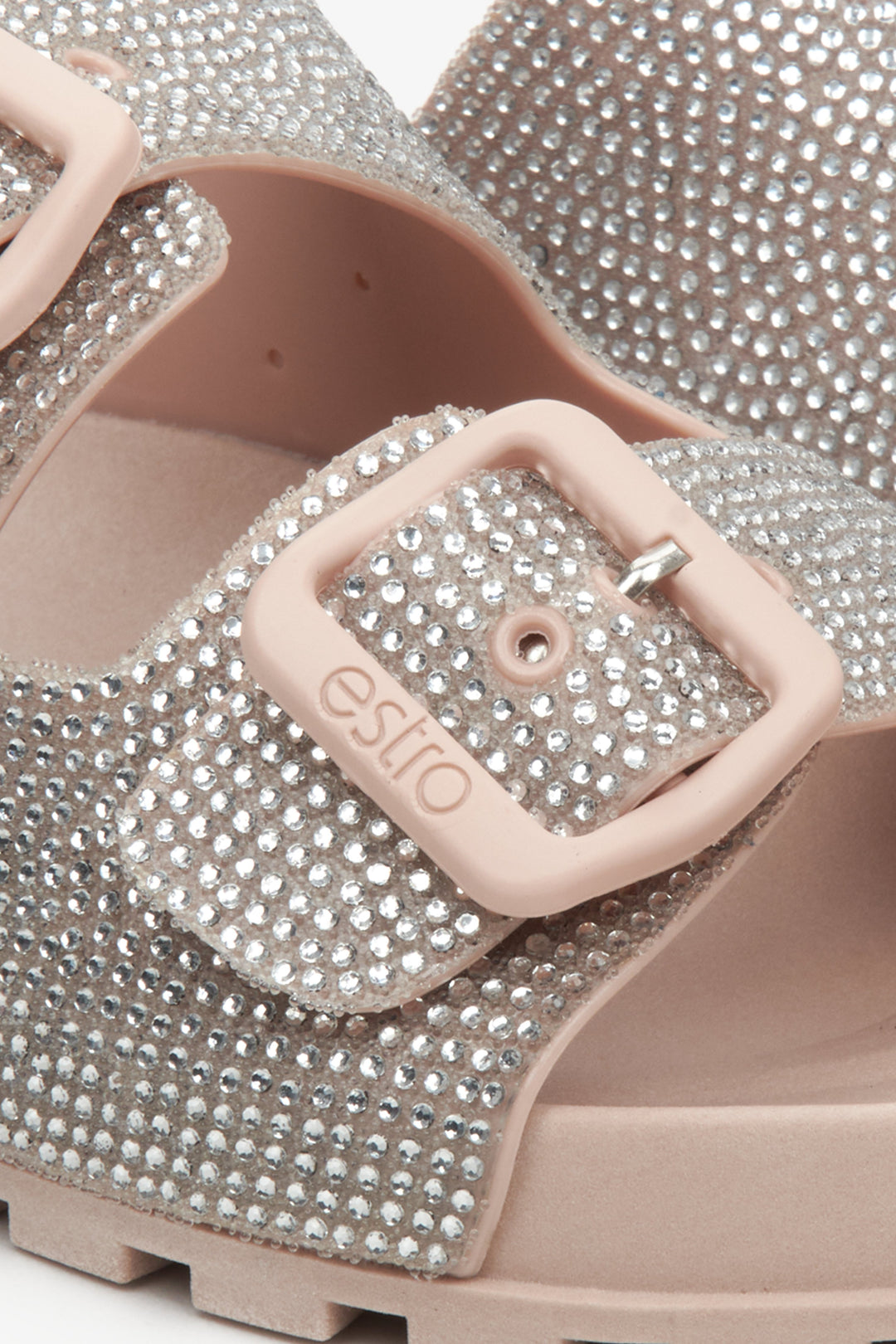 Women's light pink Estro flip-flops with rhinestones - close-up on details.