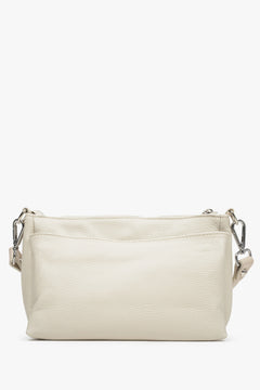 Women's light beige Estro crossbody bag made from genuine leather with a zipper.
