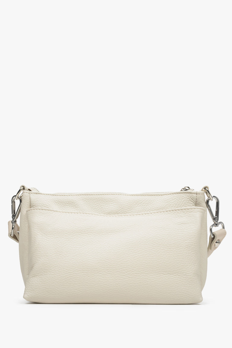 Women's light beige Estro crossbody bag made from genuine leather with a zipper.