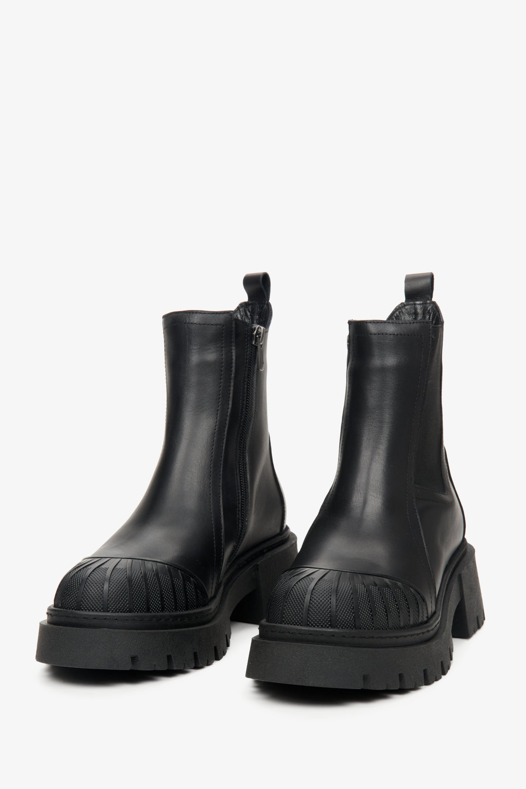 Black women's leather ankle boots by Estro in black - close-up on the toe cap of the boots.