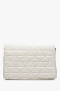 Women's Estro white leather shoulder bag - back view of the model.