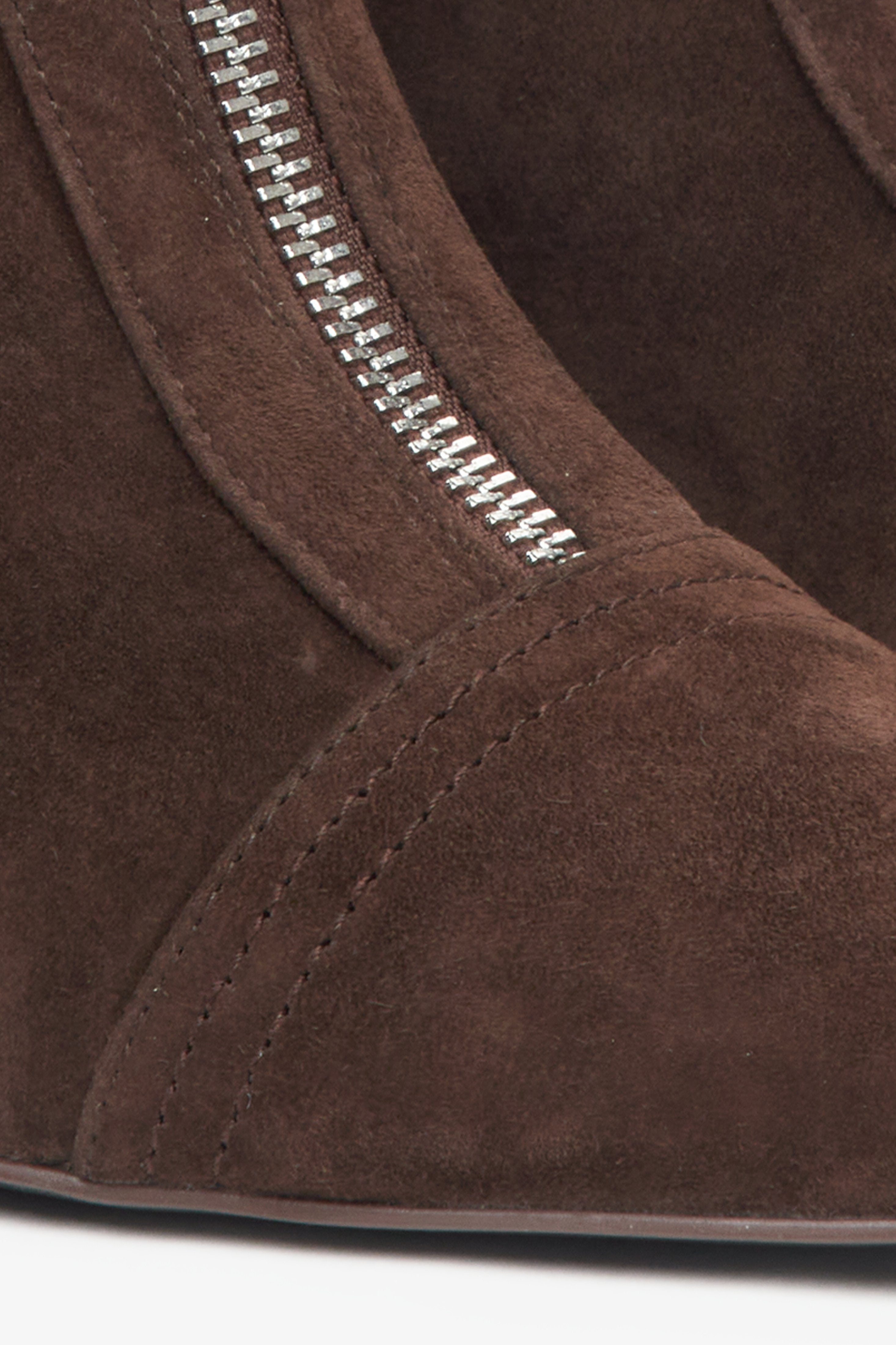 Dark brown women's ankle boots by Estro made of natural velour with a low stiletto heel – details.