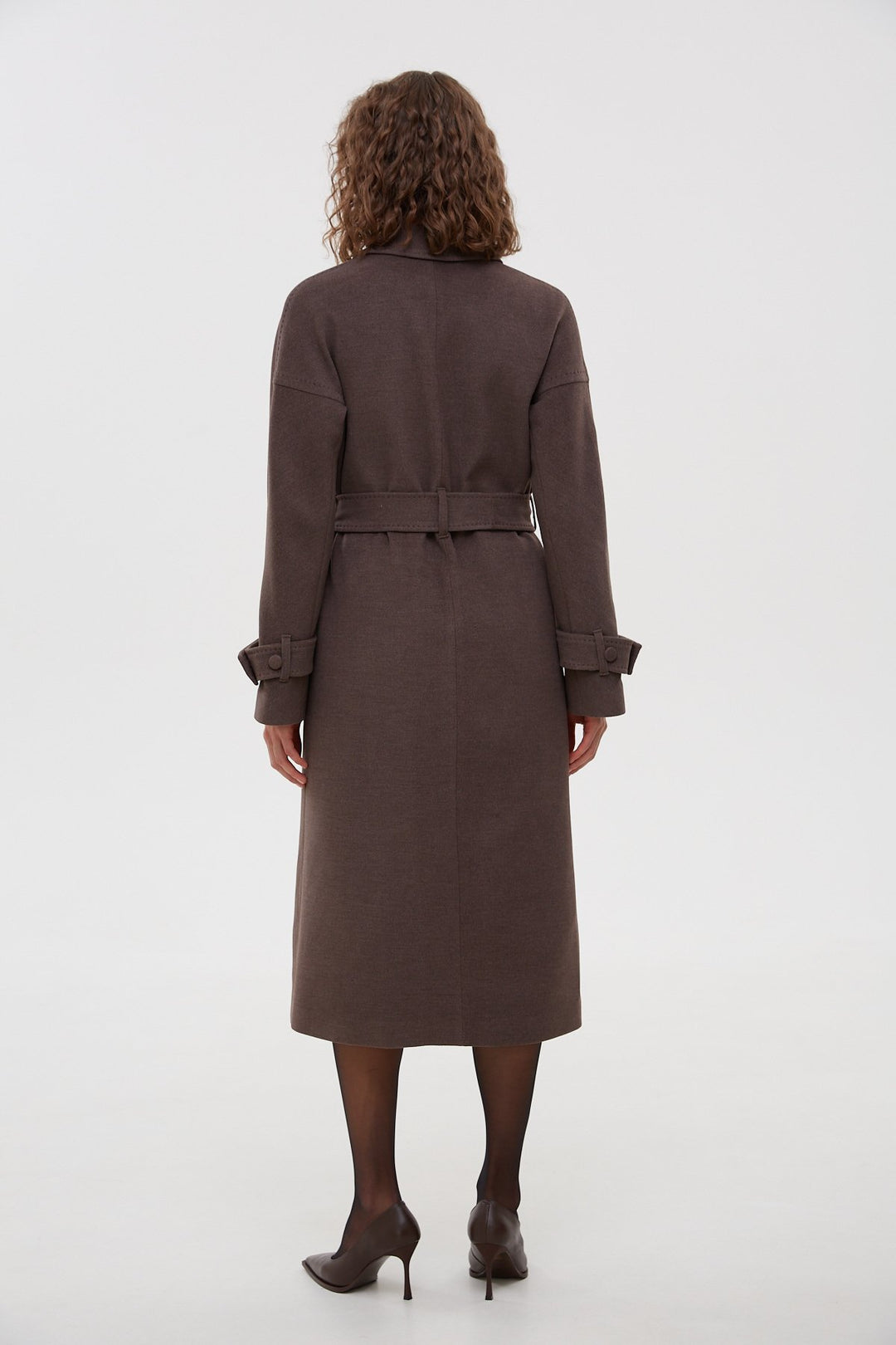 Classic saddle brown women's coat by Estro - back view of the model.