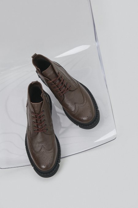 Elevated men's lace-up boots made of genuine brown leather by Estro.