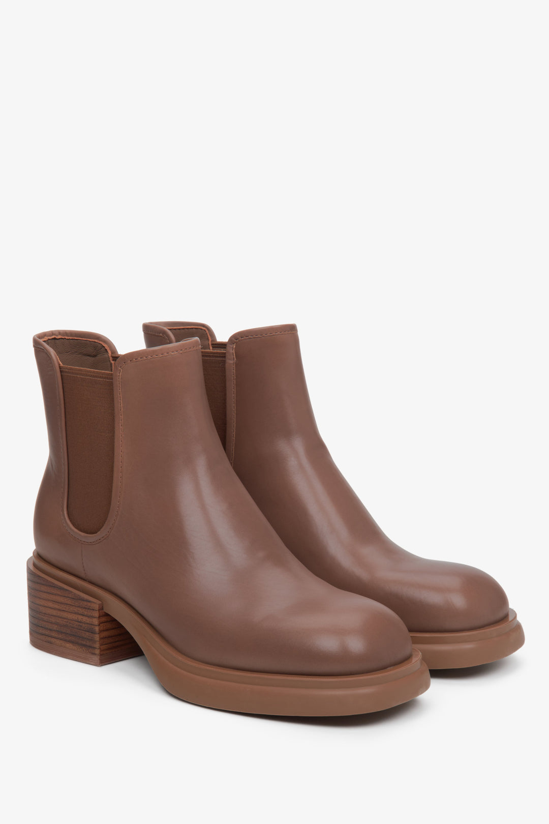 Women's brown ankle boots with a block heel.
