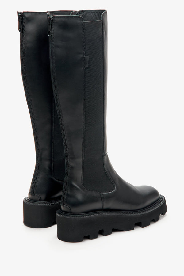 Estro women's black knee-high boots - close-up of the heel and side profile of the boots.