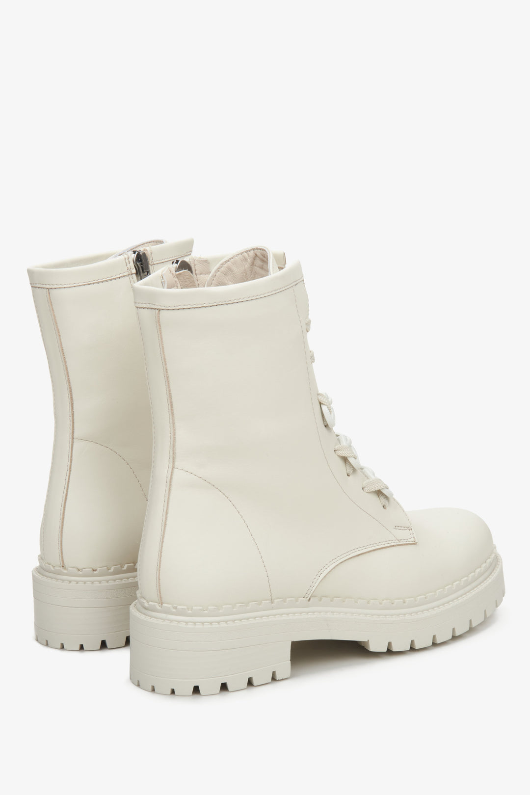 Light beige leather ankle boots Estro - a close-up on shoeline.