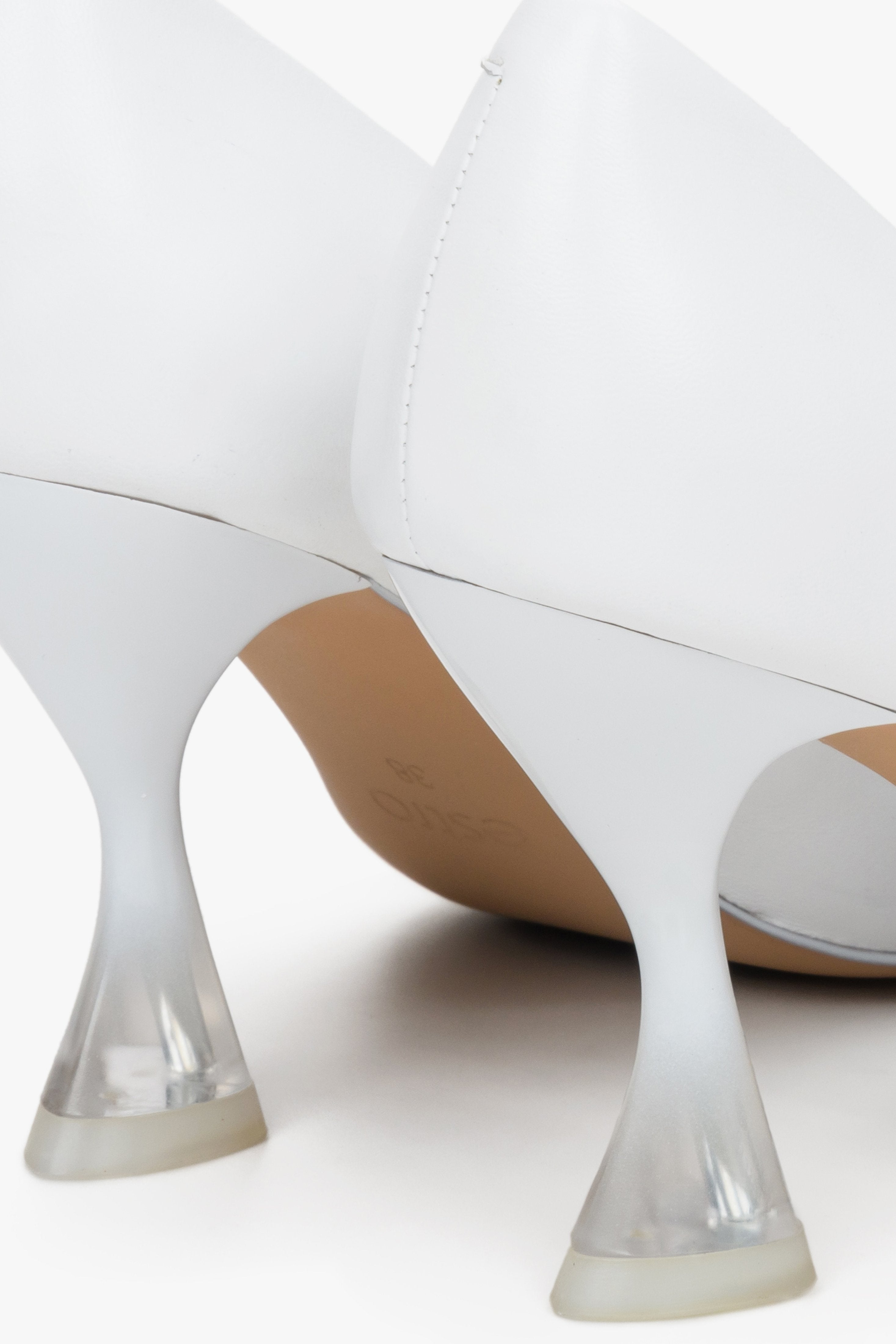 Women's white leather high-heeled pumps by Estro - close-up on the heel.