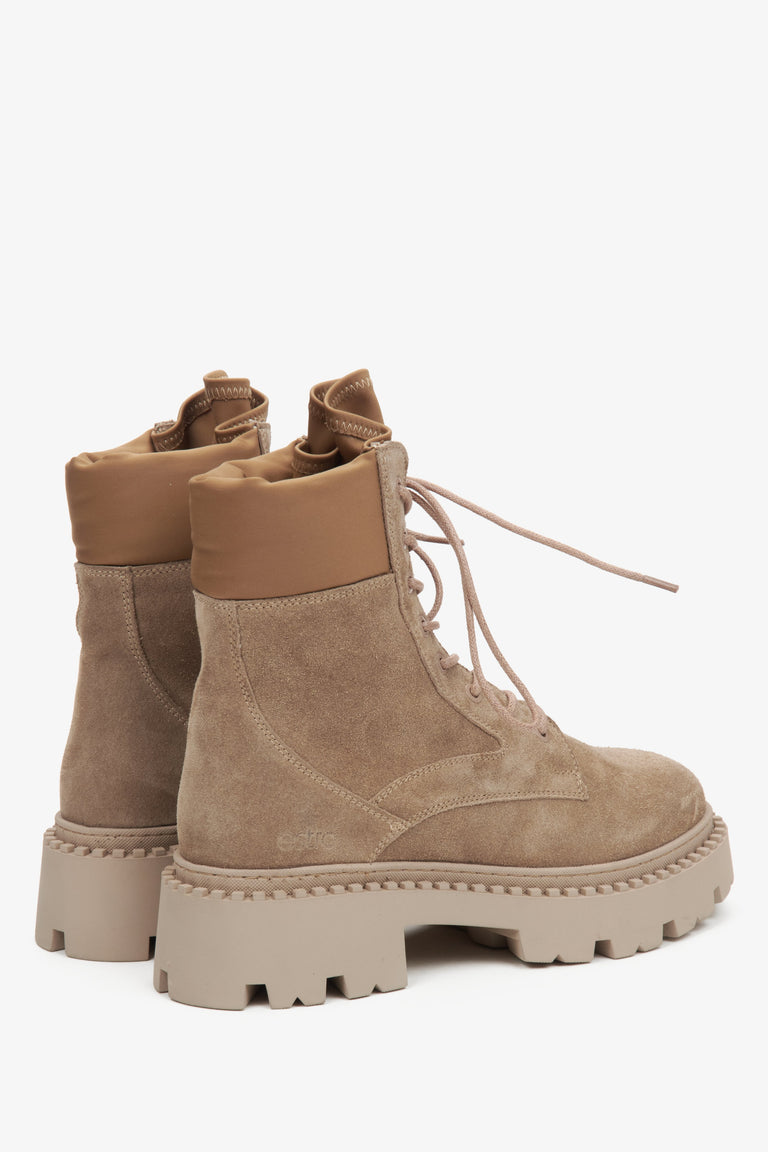 Beige velour women's ankle boots by Estro - close-up of the heel and side line of the shoe.