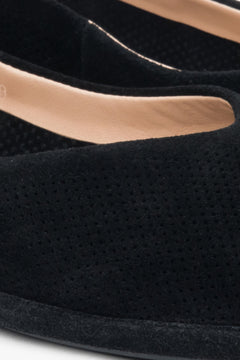 Black velour women's ballet flats by Estro – close-up on the details.