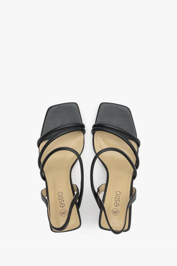 Women's black strappy sandals made of natural leather, Estro brand - presentation of the footwear from above.