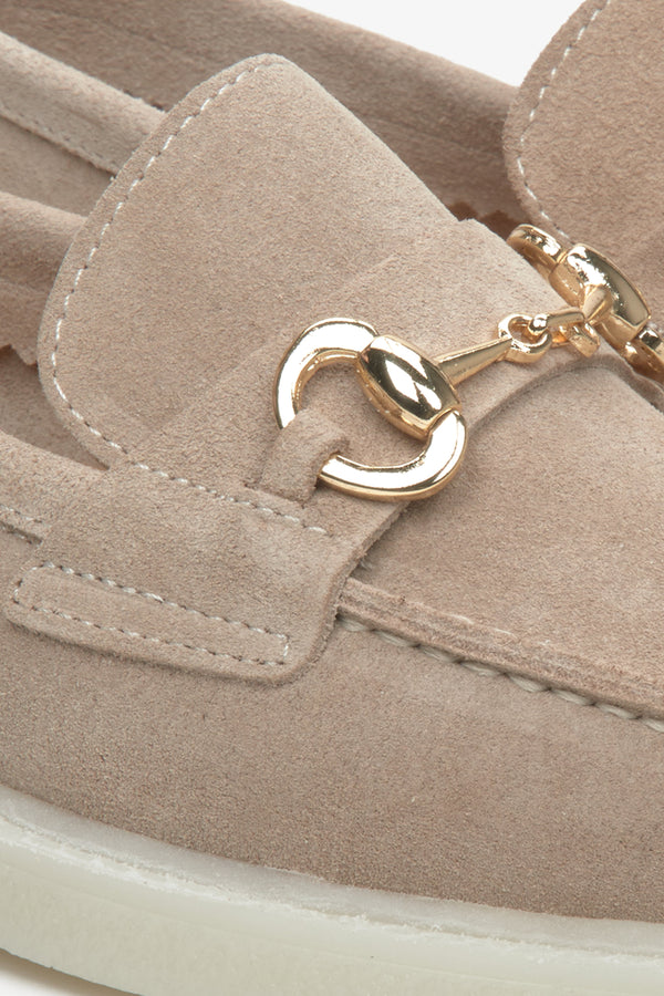 Estro beige women's loafers with gold buckle - close up on details.