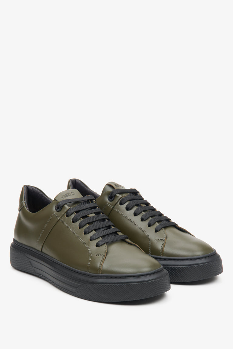 Men's leather sneakers in khaki - close-up of the toe and side seam.