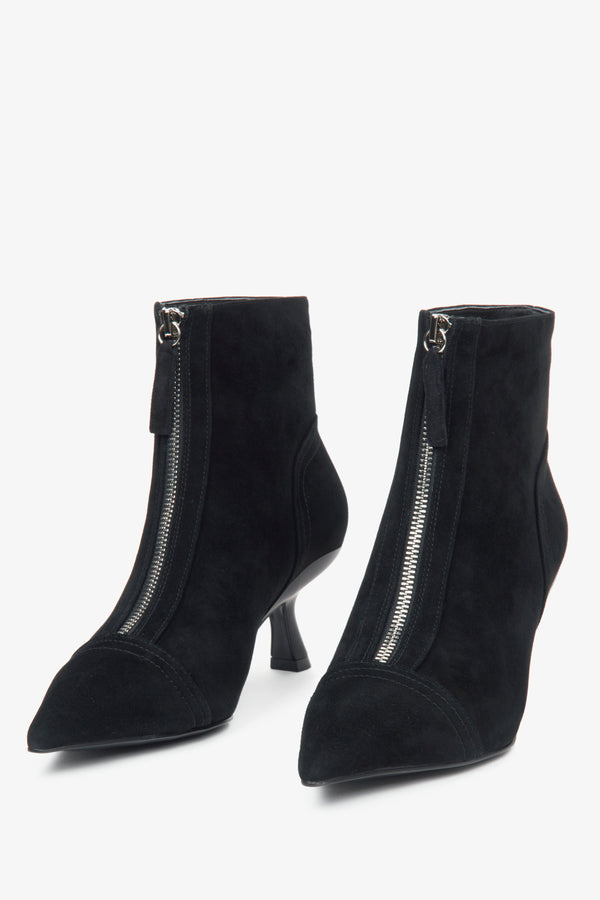 Women's black ankle boots made of natural velour with a low stiletto heel by Estro.