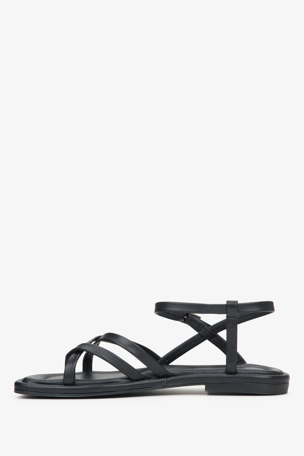 Women's black leather, lightweight sandals with thin criss-cross straps.