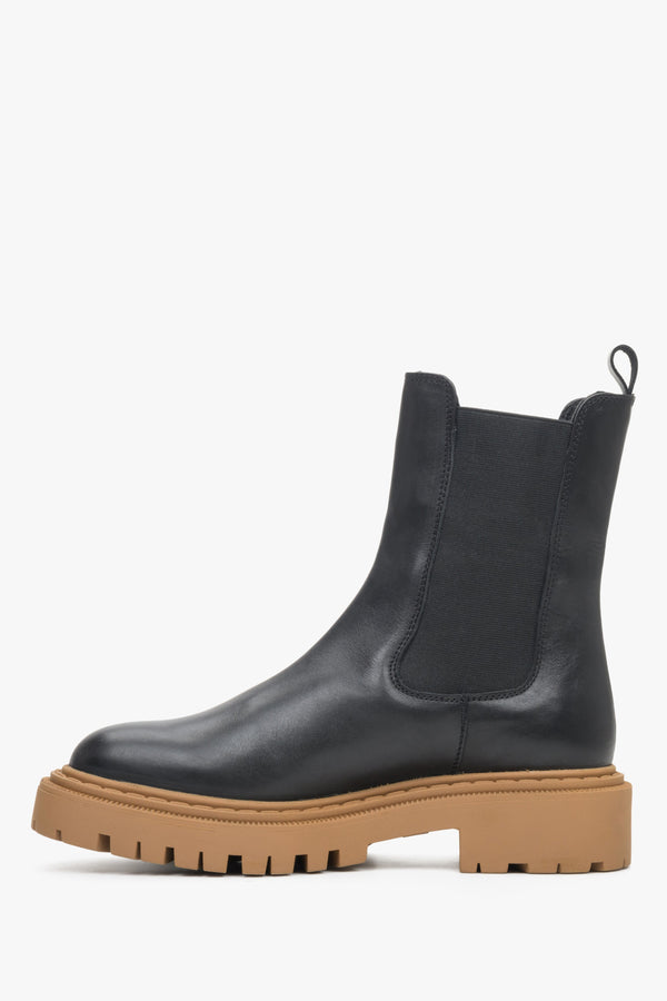 Women's black chunky sole chelsea boot - shoe profile. 