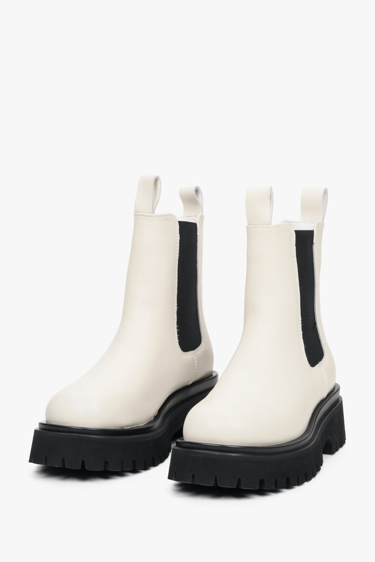 Estro women's black and white leather ankle boots.