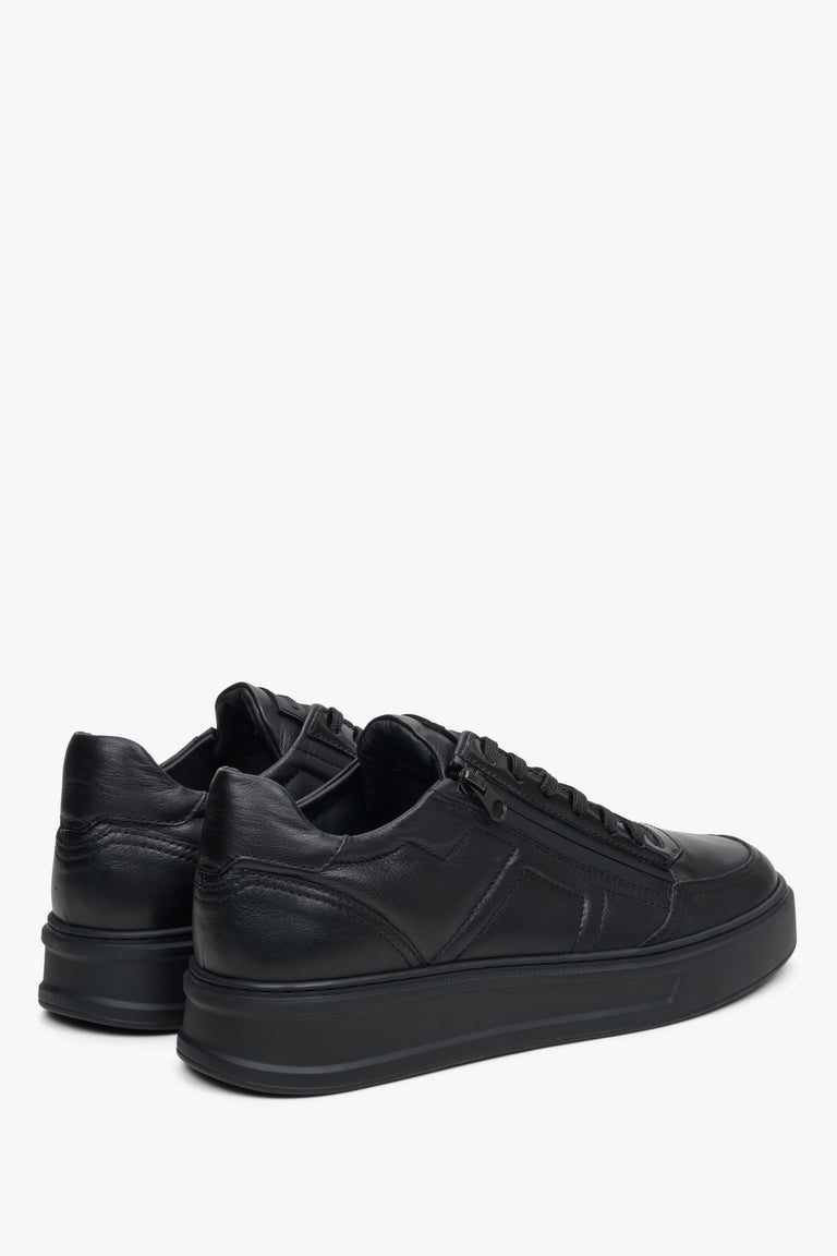 Men's black leather sneakers by Estro - close-up on the side line and heel.