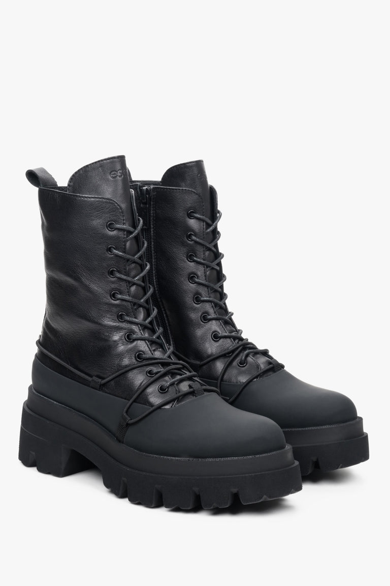  High women's boots with laces, made of black natural leather by Estro - close-up on the toe cap and side seam.