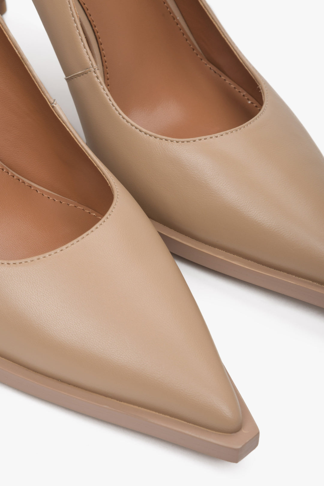 Women's beige leather pumps by Estro - close-up on detail.