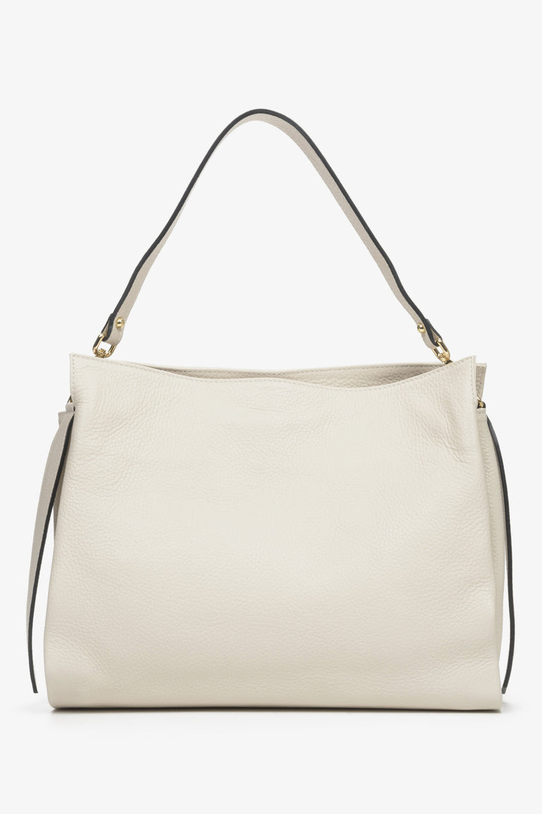 Light Beige Estro women's leather handbag with gold accents - back view presentation of the model.