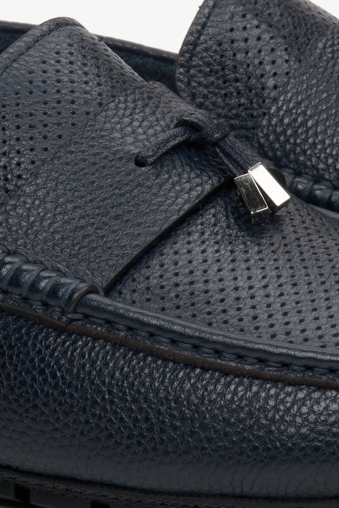 Men's leather loafers for fall in navy blue - close-up on the details.