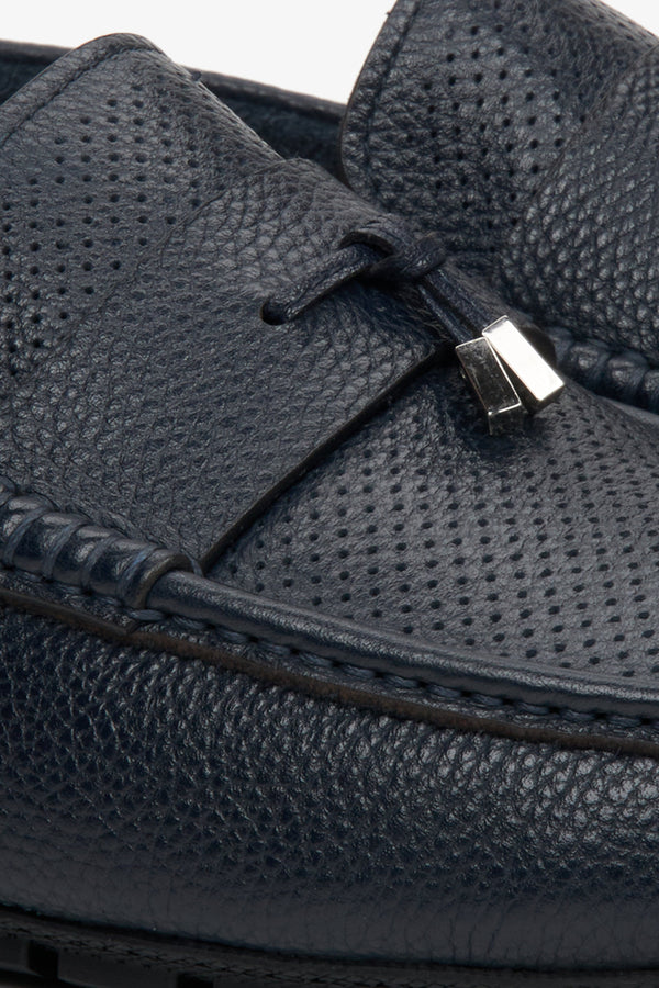 Men's leather loafers for fall in navy blue - close-up on the details.