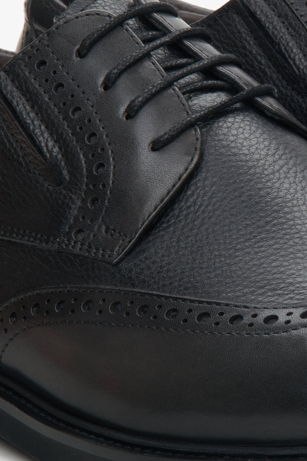  Men's black lace-up shoes - close-up on details.