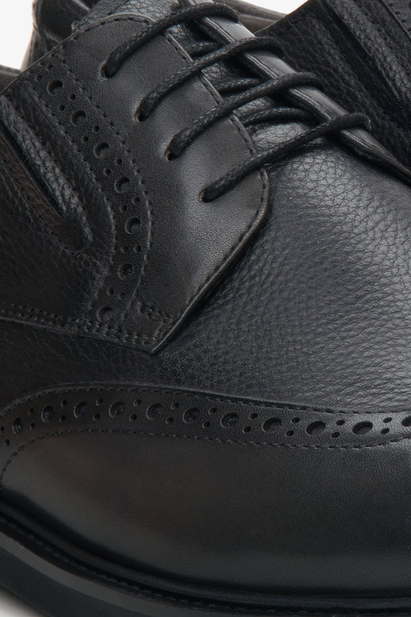  Men's black lace-up shoes - close-up on details.