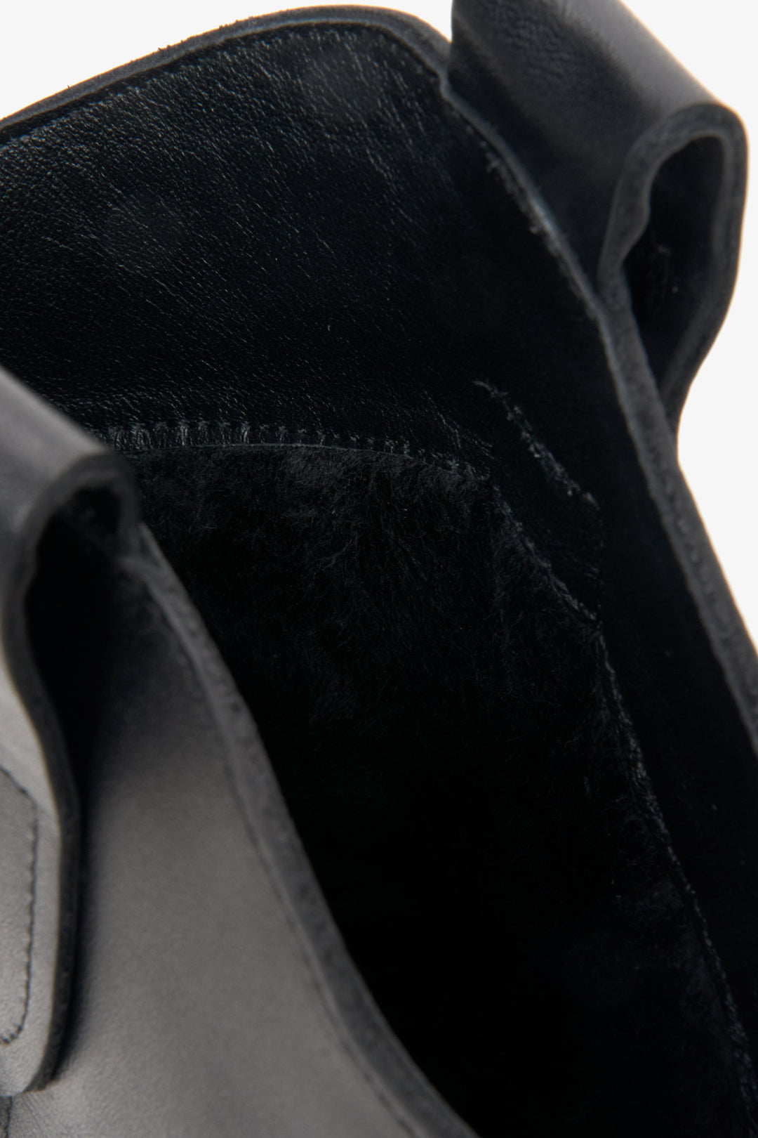 Women's black leather cowboy boots by Estro - close-up on details.