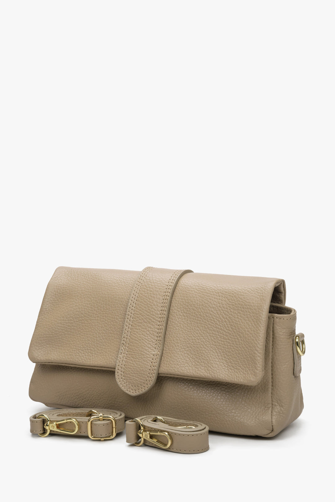 Women's beige leather handbag with adjustable strap.