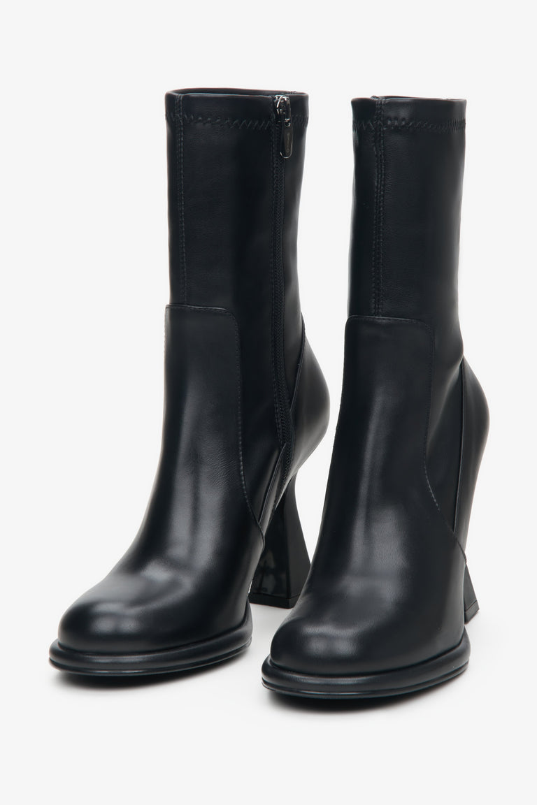 Women's black ankle boots with funnel heel made of genuine leather by Estro - a close-up on the toeline.