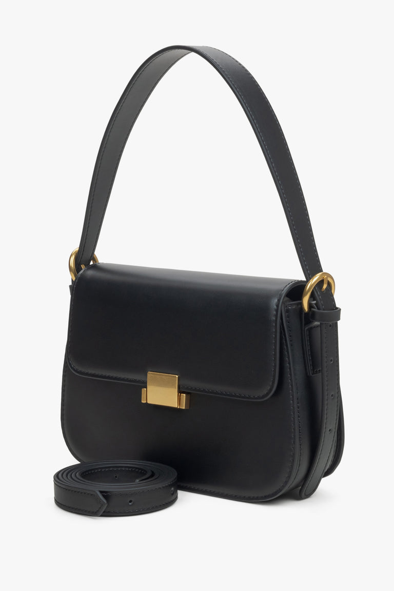 Estro women's black leather shoulder bag with gold hardware.