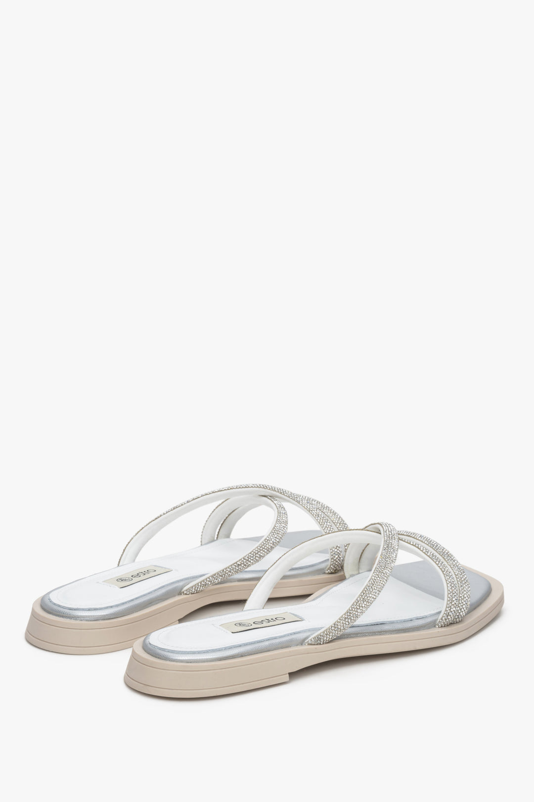 Women's flat slide sandals in silver colour with zirconia.