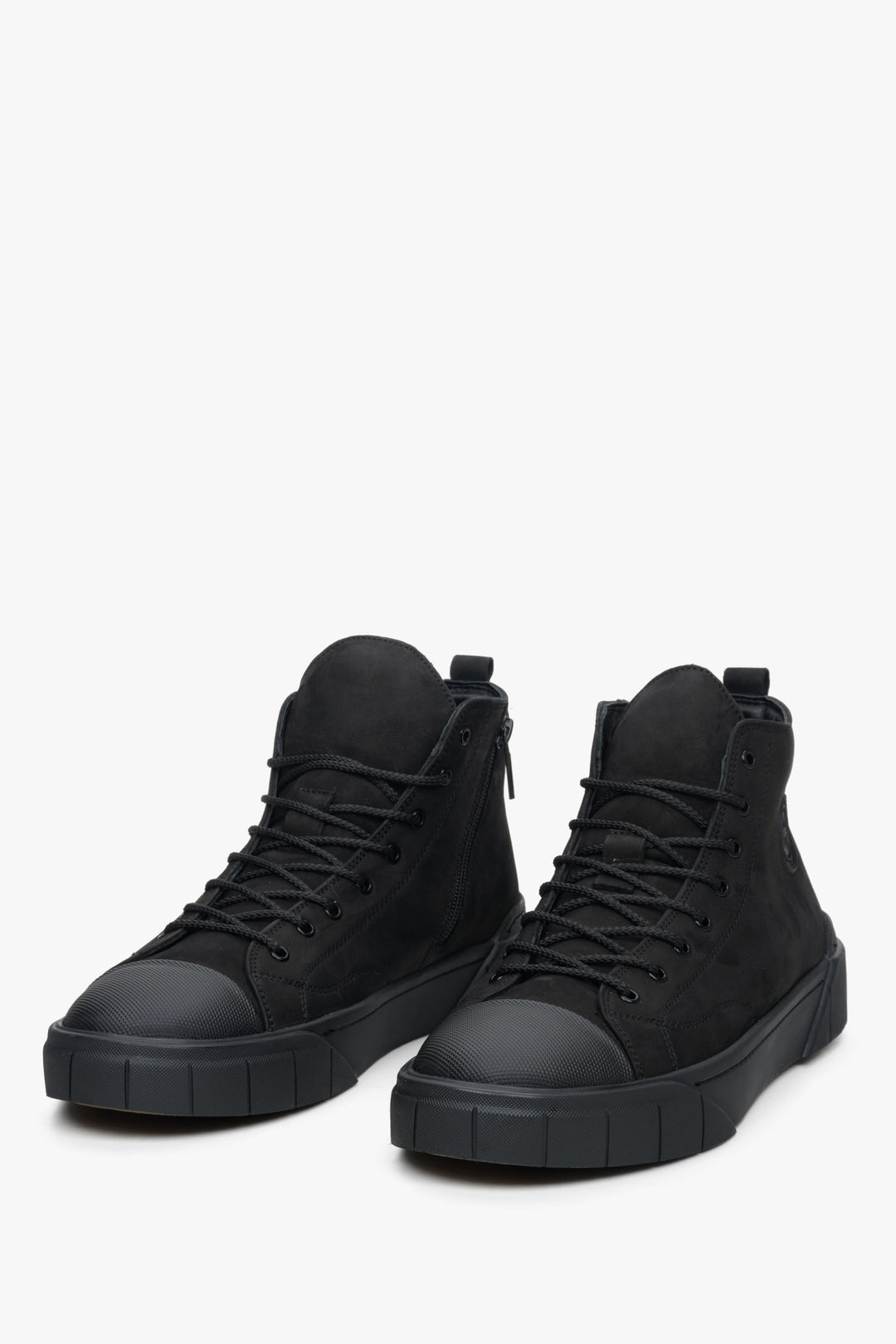 Men's black high-top winter sneakers in suede by Estro - close-up on the toe of the shoe.