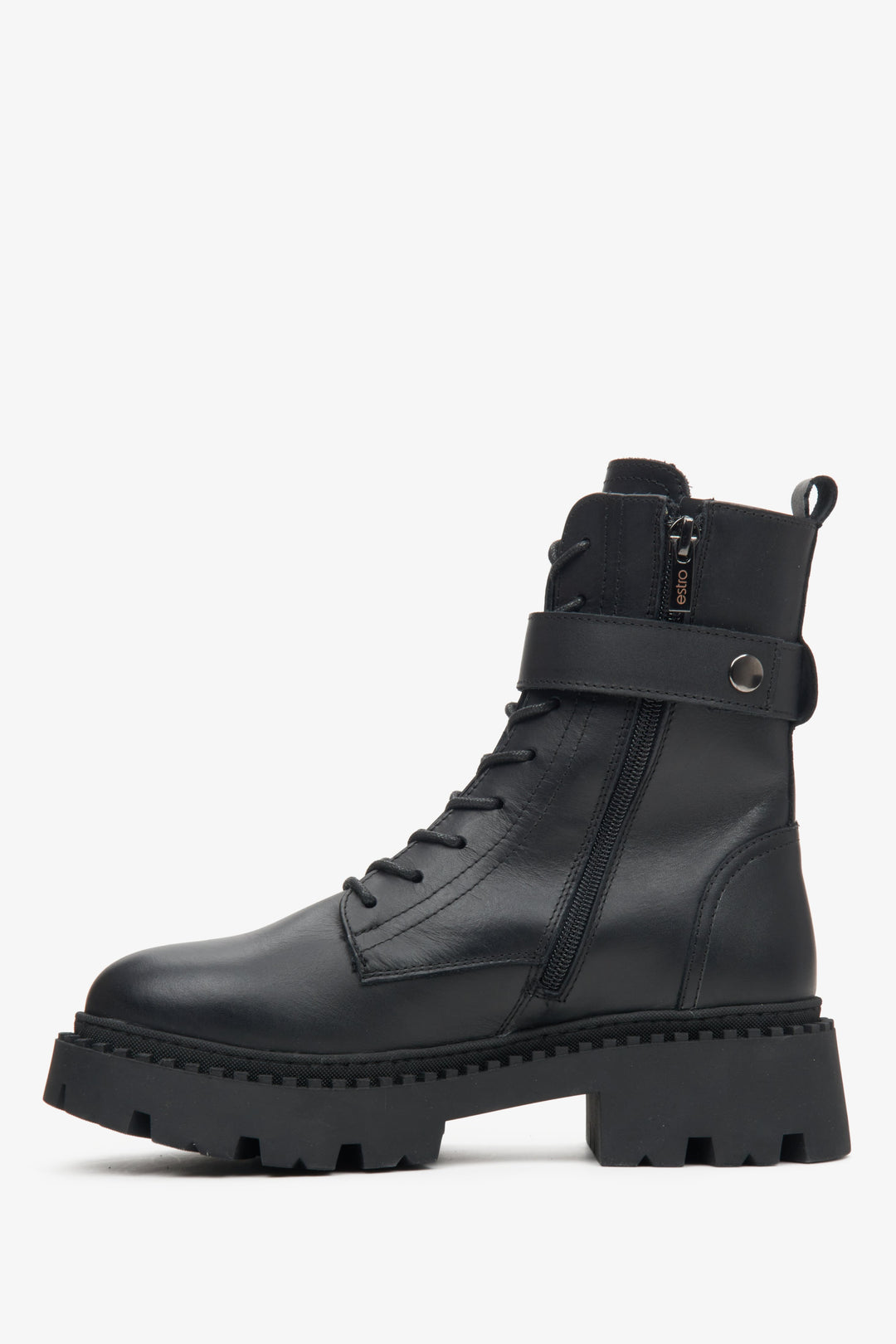 Women's leather black winter boots with insulation and a decorative strap - shoe profile.
