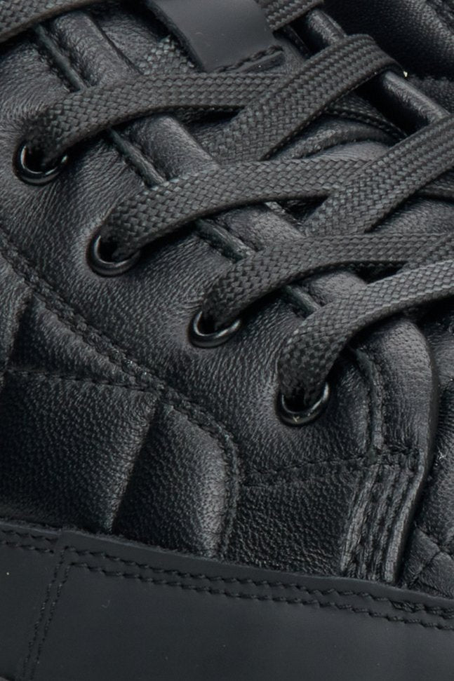 Men's black, high boots made of genuine  leather, winter Estro - close-up of the lacing system.