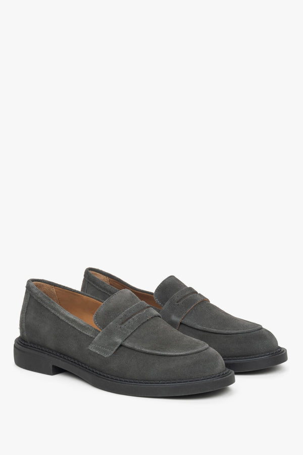 Grey women's penny loafers.