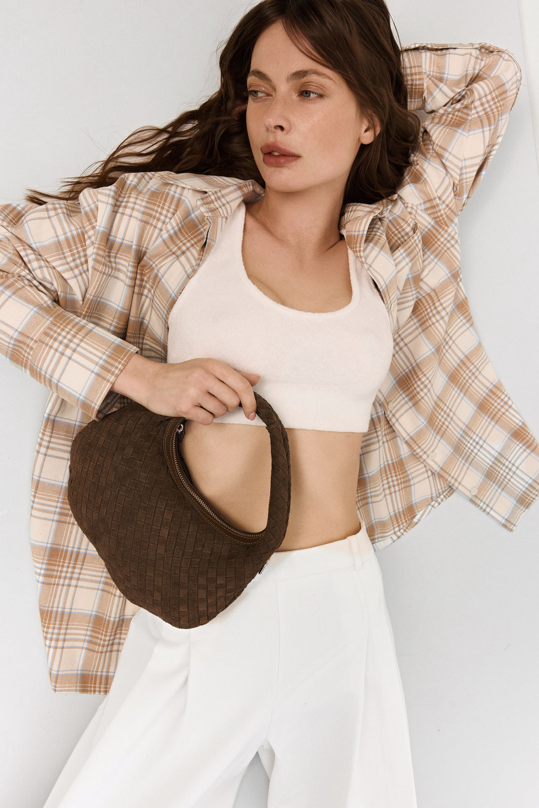 Small brown women's handbag by Estro, made of natural velour.