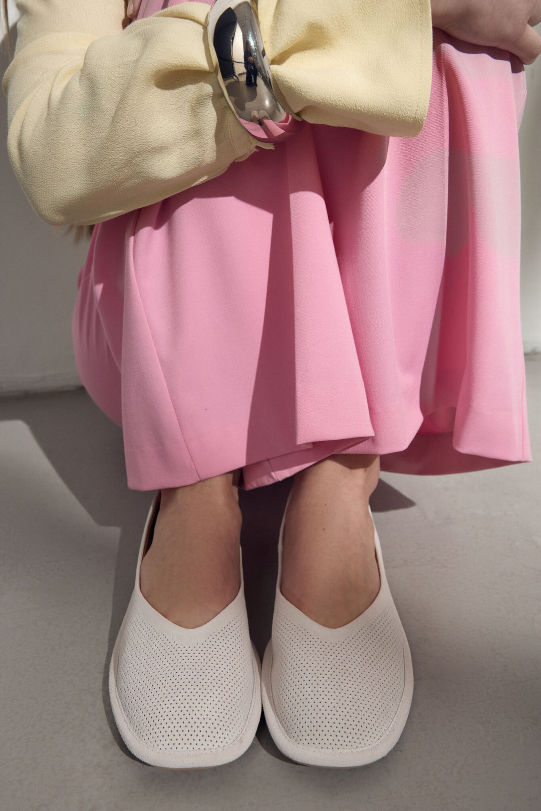 Women's white ballet flats by Estro, made of genuine perforated velour.