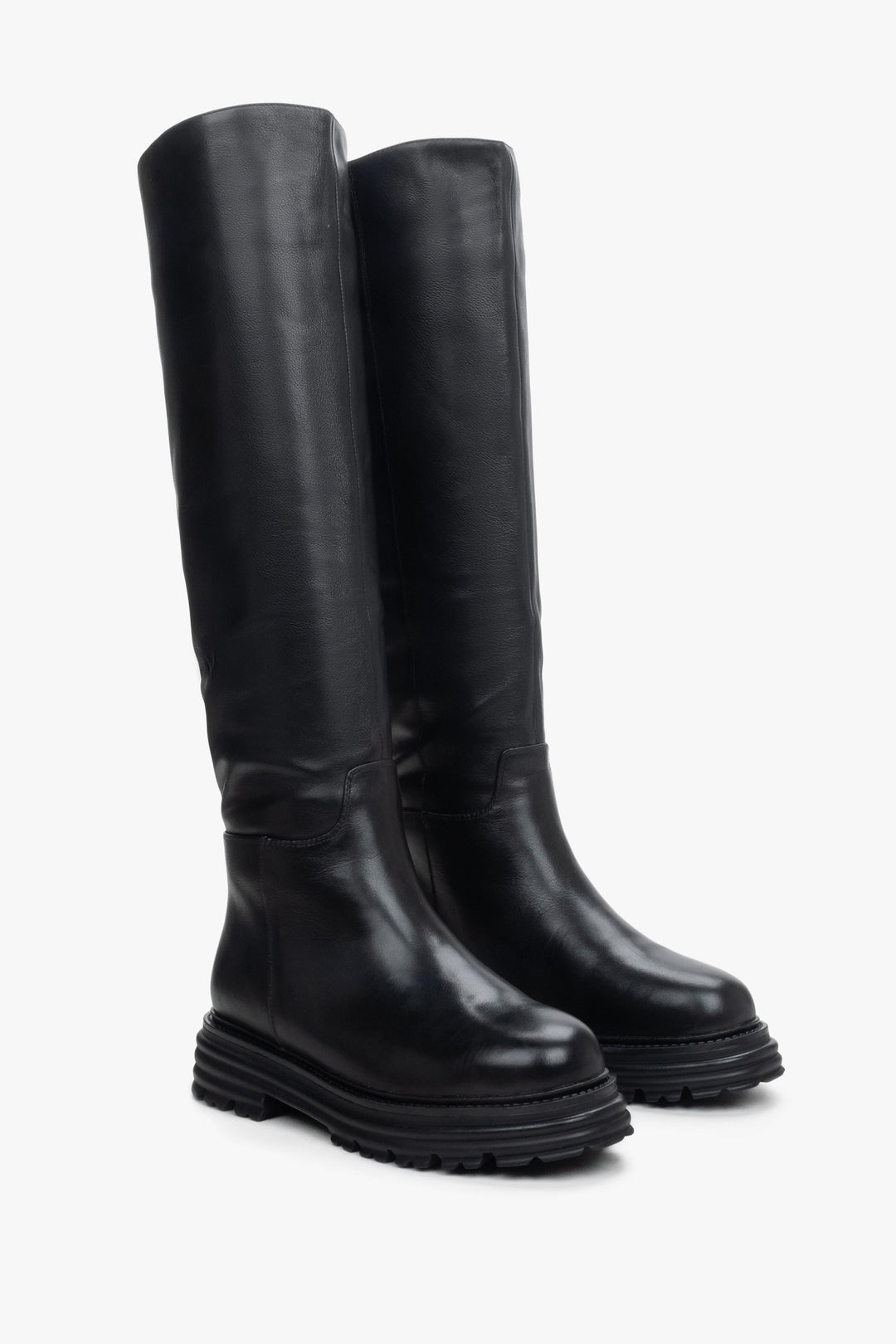 Women's knee-high boots in black.