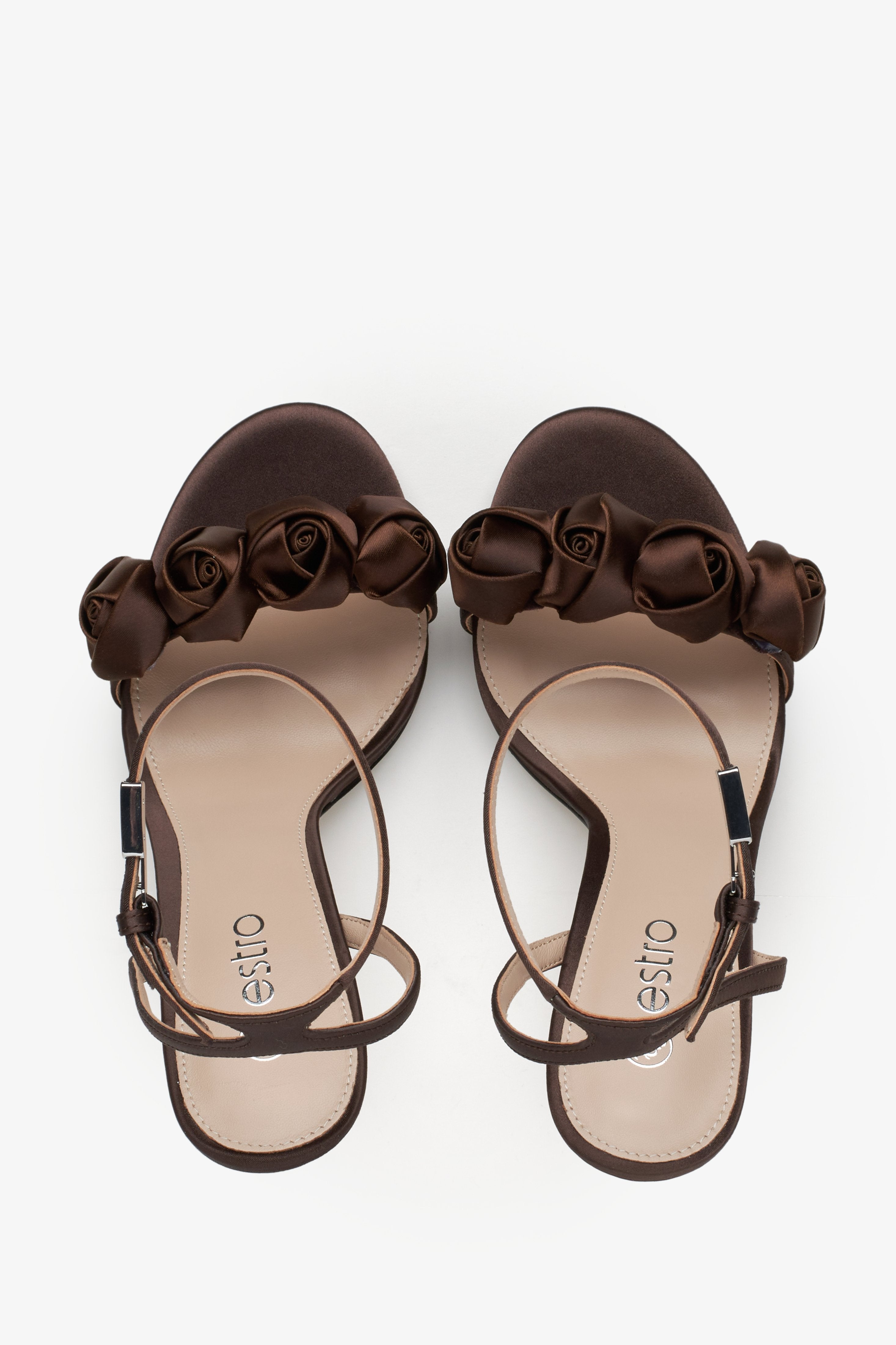 Women's dark brown sandals with floral ornamented heels - top view presentation.