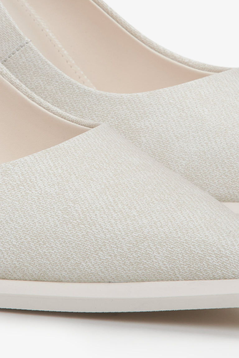 Light beige textured denim women's pumps by Estro - close-up on detail.