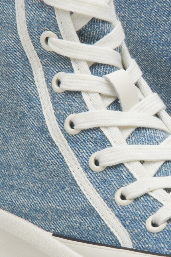 High-top athletic women's sneakers by Estro in blue - close-up on details.