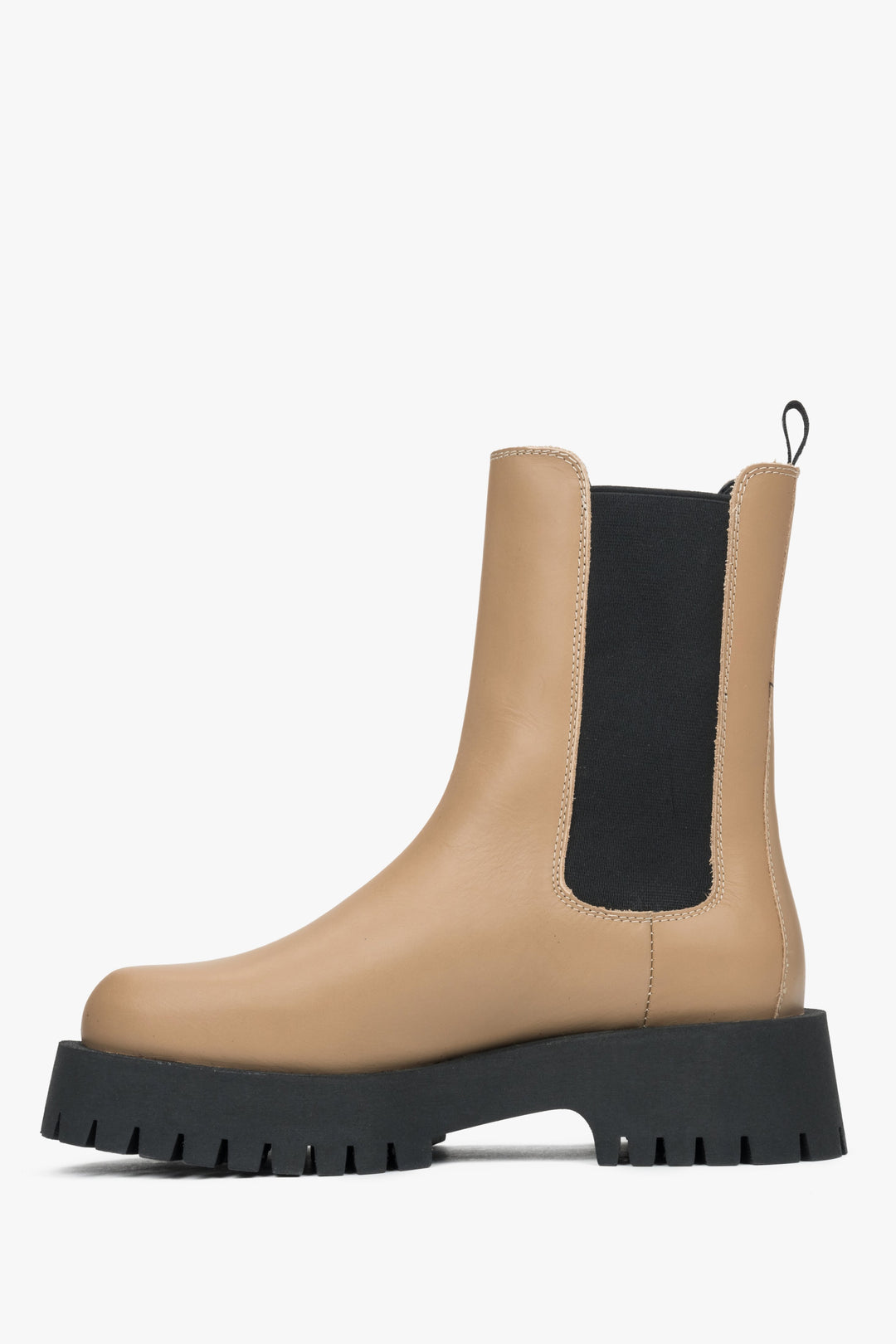 High beige leather chelsea boots for women by Estro - side profile of the shoe.