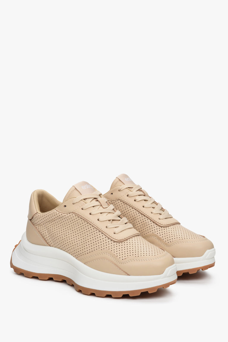 Women's beige Estro sneakers made of genuine leather with perforation.