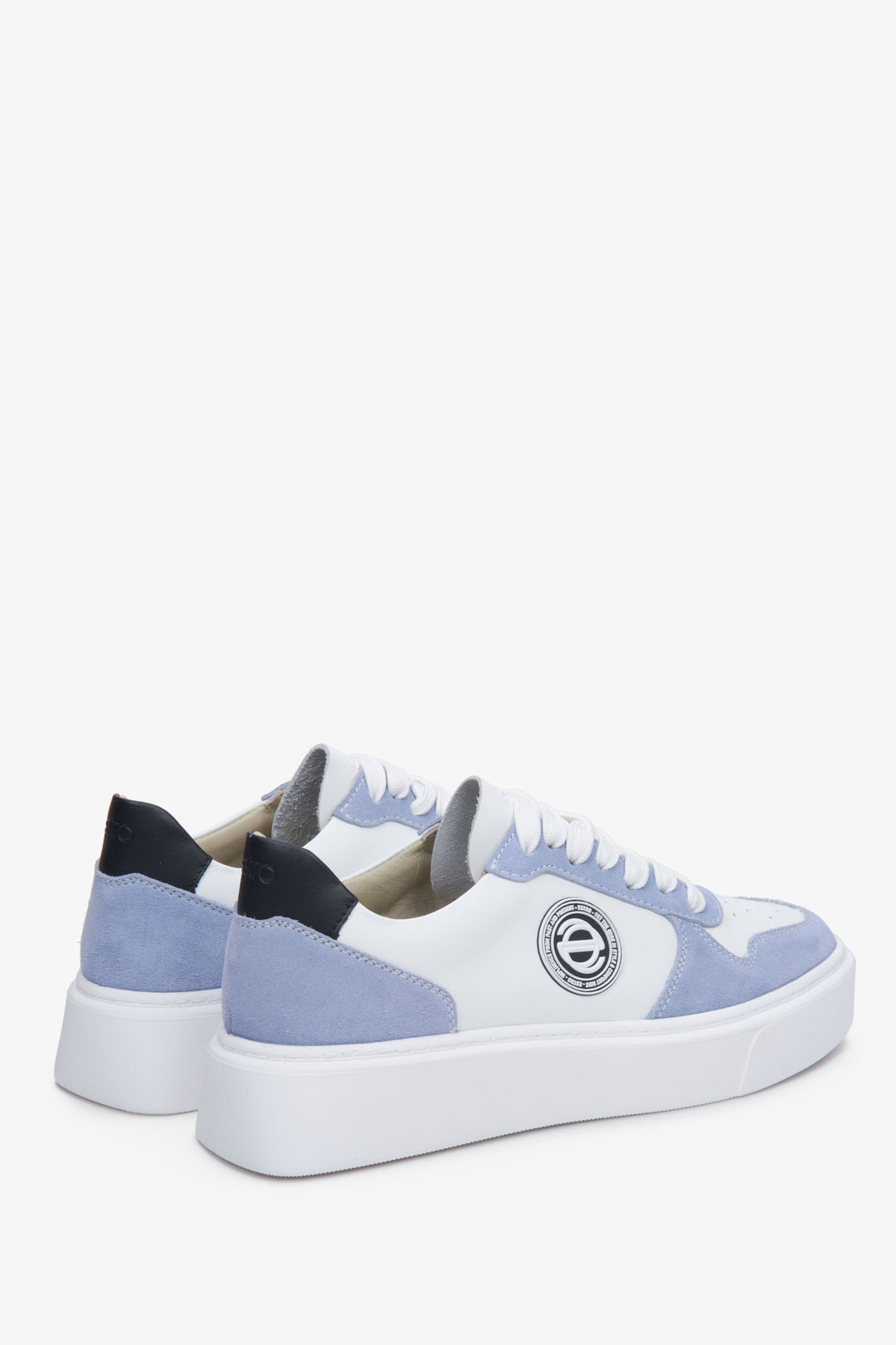 Blue and white sneakers, made from leather and natural velvet for women - presentation of the back part of the footwear. 