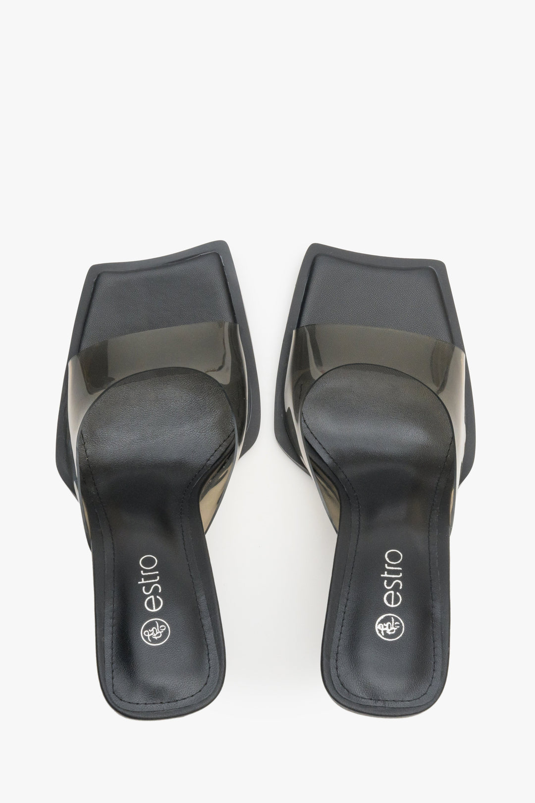 Womens's high-heeled sandals with a transparent strap and black sole - top view model presentation.